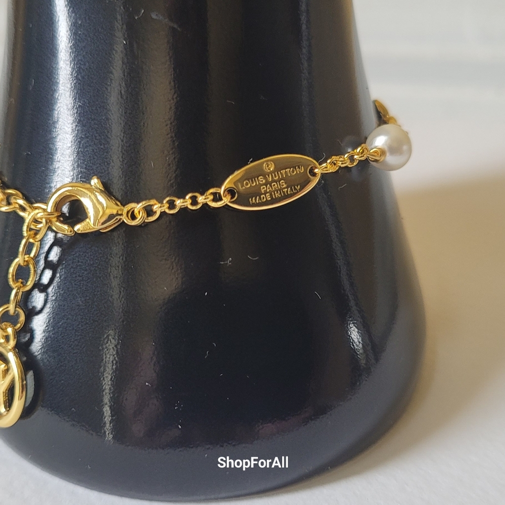 Louis Vuitton Gold Tone Charm Bracelet - Picture 8 of 17